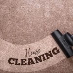 house cleaning words shown in carpet being vacuumed